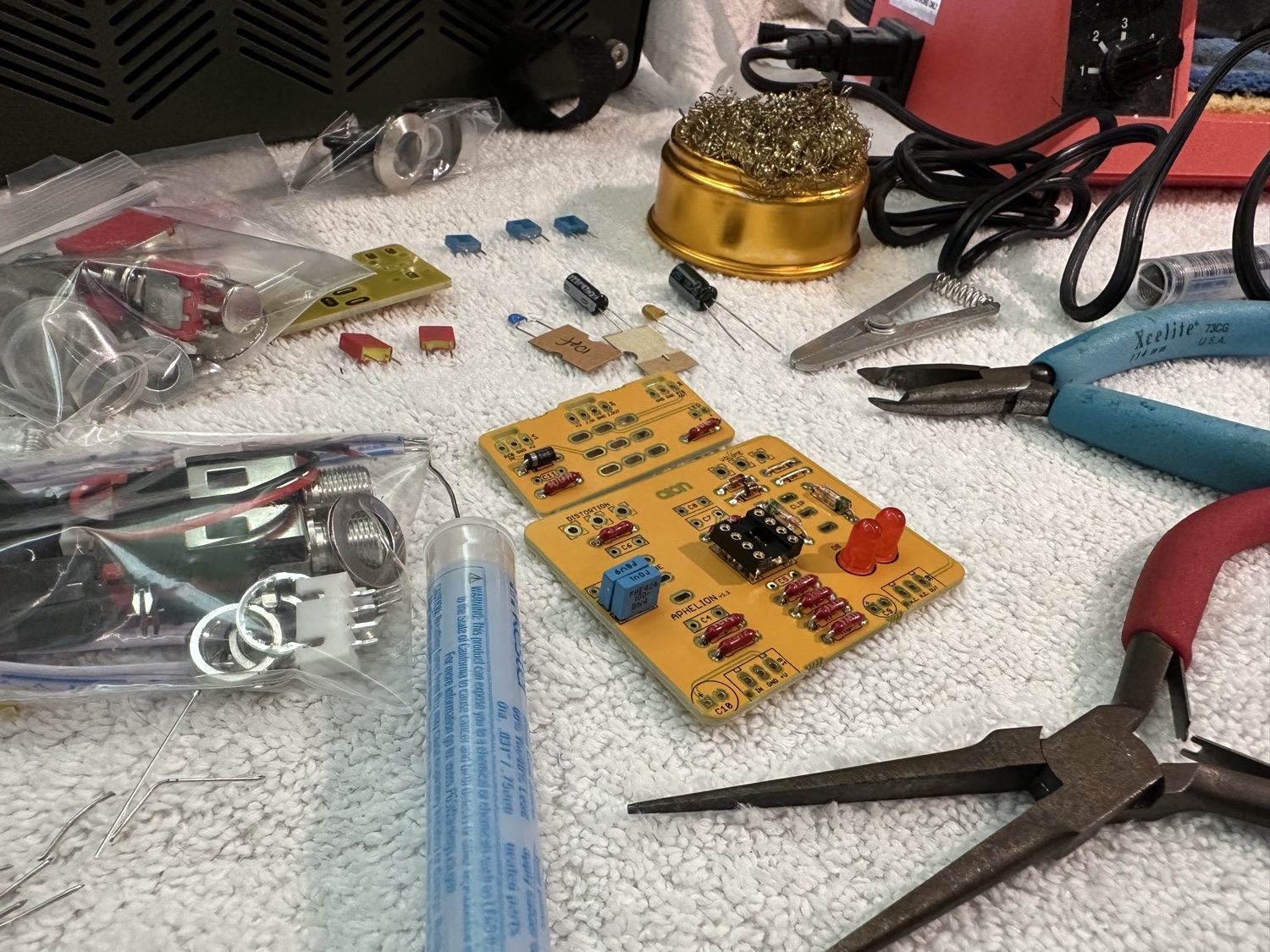 The AionFX Aphelion Vintage Distortion circuit board getting populated with components.